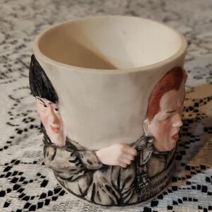 Three Stooges art ceramic container.